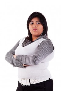 Defensive Hispanic woman